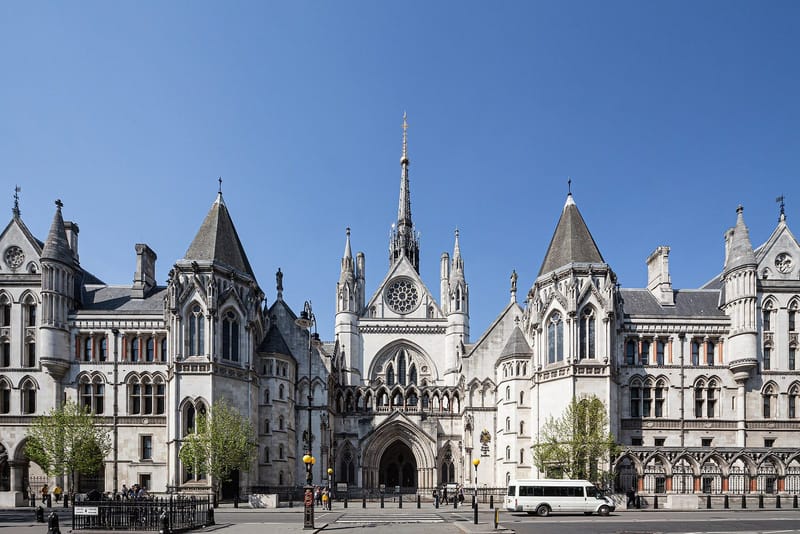 Gothic stone facade of the Royal Courts of Justice on the Strand in London, home of the High Court