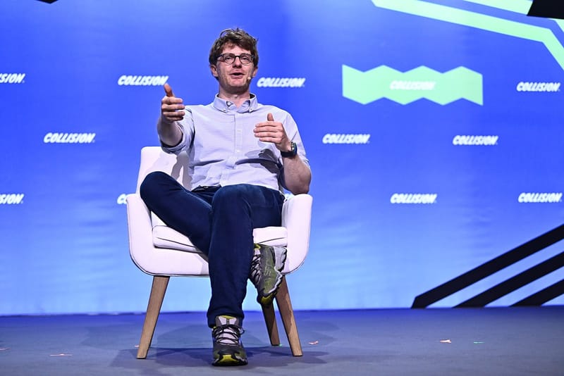 Richard Socher, now CEO of Recursive, on stage with TechCrunch editor Devin Coldewey at the Collision 2024 conference in Toronto