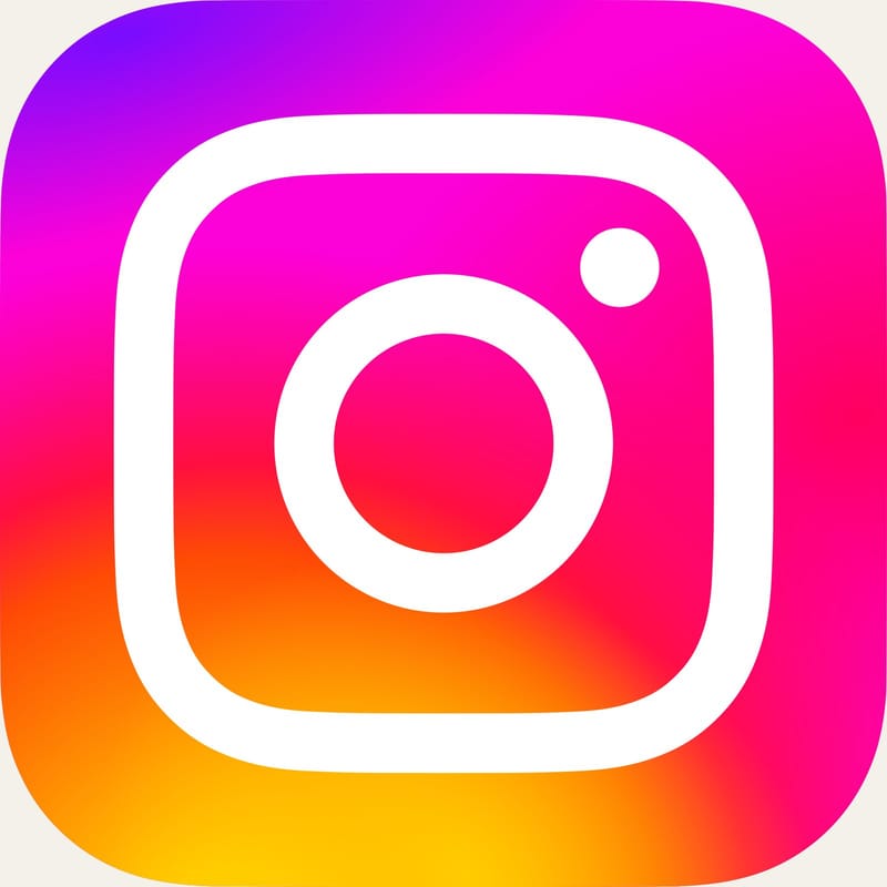 Instagram logo, a white camera outline on a purple-to-orange gradient square