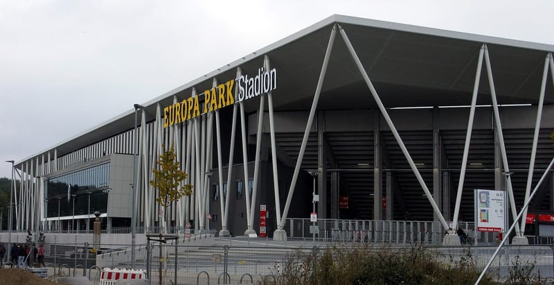 Exterior of the Europa-Park Stadion in Freiburg, SC Freiburg's home ground, with the stadium name on the facade