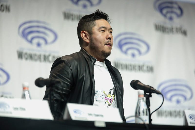 Voice actor Eric Bauza speaking on a panel at WonderCon 2018 in Anaheim, California