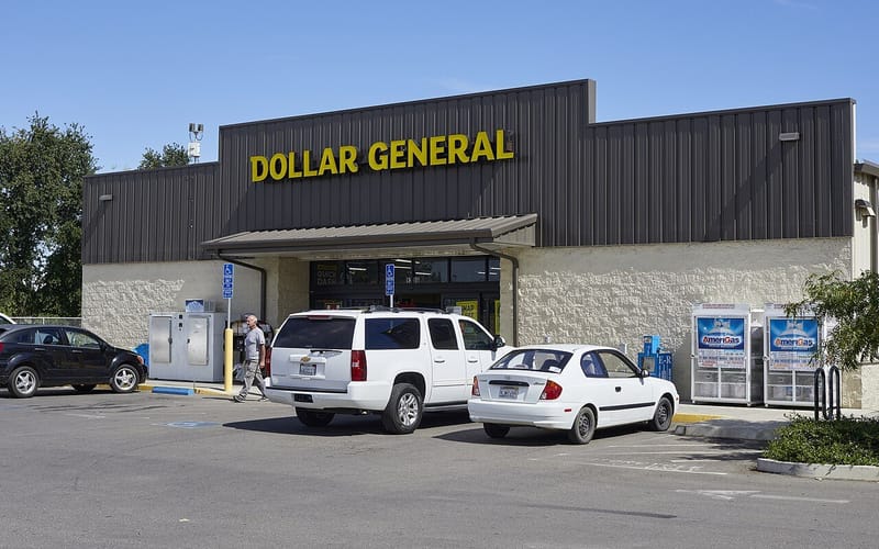 Exterior of a Dollar General store with its yellow and black sign in Durham, California