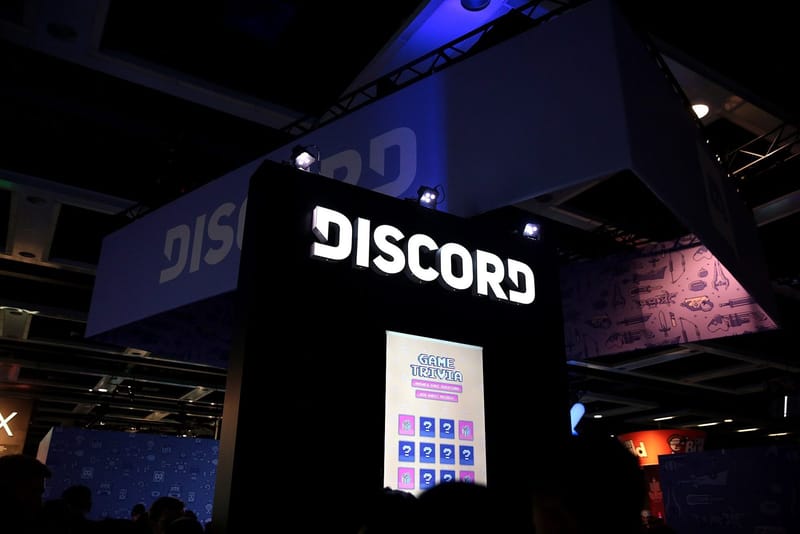 Discord exhibitor booth with Discord branding at a convention