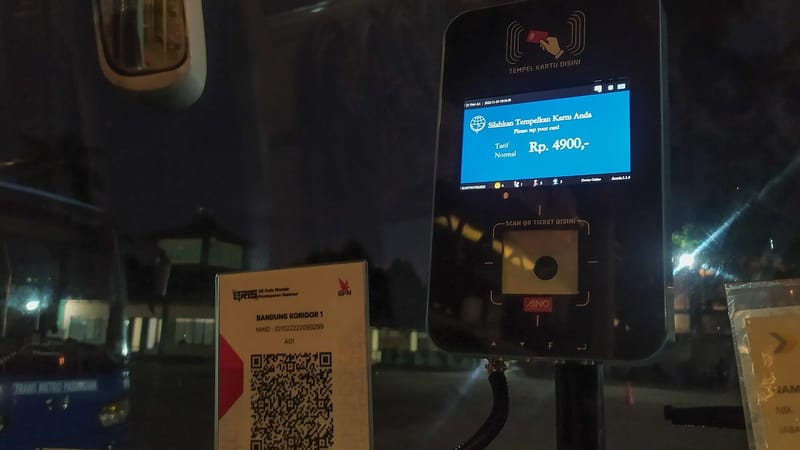 Tap-on-bus Machine and QRIS Payment System on a Trans Metro Pasundan Bus